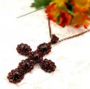 Vintage facetted oval garnet cross pendant