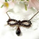 Vintage garnet bow and drop necklace in Victorian style