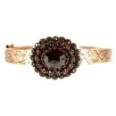 Vintage garnet bangle w/ oval facetted stone and Vienna engraving //L